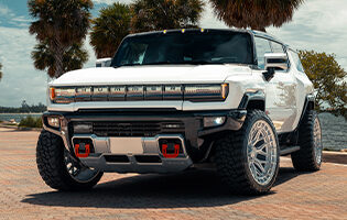 White Hummer on Polished Wheels